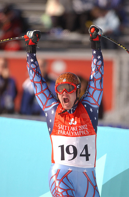 Francisco Kjolseth | Tribune file photo
Jim Lagerstrom of the U.S. is overjoyed with his silver medal run while competing in the LW4 category in the men's downhill of the 2002 Salt Lake Paralympic Winter Games at Snowbasin Mountain Resort.
