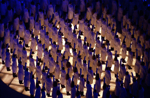 Trent Nelson | Tribune file photo
The Utah State University Combined Choir performs the National Anthem at the Salt Lake 2002 Paralympic Opening Ceremony, Rice-Eccles Stadium, Thursday evening, March 7, 2002.