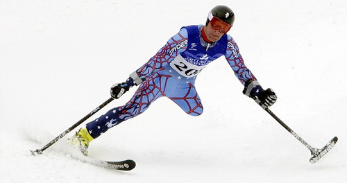 Steve Griffin | Tribune file photo
Jason Lalla, of the USA, eyes a turn in the second run of the men's giant slalom at Snowbasin Ski Resort on March 13, 2002. Lalla won the silver medal in the LW2 category.