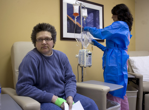 Al Hartmann  |  The Salt Lake Tribune
Brenda Olson undergoes chemotherapy at UCS Cancer Center at Jordan Valley Hospital with the drug Doxil that just months ago she was told was unavailable. This is dose two of four allotted her under a rationing program run by the drugmaker, Janssen. 