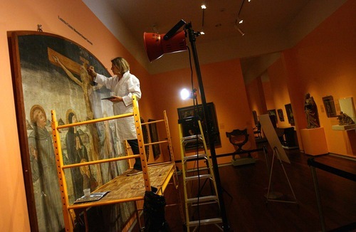 Leah Hogsten | The Salt Lake Tribune  
Catherine Fischer works in November to restore a 500-year-old fresco titled 