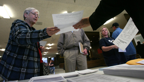 Steve Griffin  |  The Salt Lake Tribune

Democrats fill out paperwork during neighborhood caucuses Tuesday night to select delegates to party conventions. The delegates elected in caucuses at Eisenhower Junior High School in Taylorsville and 147 other locations around the state will pick Democratic nominees in a variety of races.