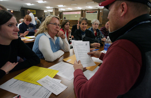 Steve Griffin  |  The Salt Lake Tribune

Democrats in Taylorsville and nearby areas elect delegates to county and state party conventions during caucuses at Eisenhower Junior High School. Democrats said turnout this year at some 148 locations statewide was a big improvement over two years ago.