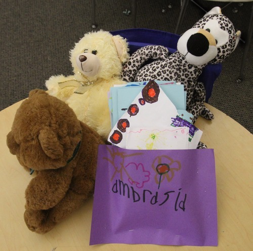 Rick Egan  | The Salt Lake Tribune 
First-grade students from Whittier Elementary school made cards and placed stuffed animals Friday on the desk of 6-year-old Ambrosia Amalathithada -- who died after she and her mother were hit by a car at a State Street crosswalk on Wednesday in Salt Lake City.