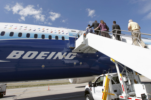 Al Hartmann  |  The Salt Lake Tribune
Visitors take a tour of the new Boeing 787 Dreamliner on Thursday, March 15, 2012, in Salt Lake City.