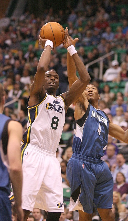 Paul Fraughton | The Salt Lake Tribune.
Utah's Josh Howard is blocked from behind by Minnesota's Wesley Johnson. The Utah Jazz played the Minnesota Timberwolves at Energy Solutions Arena.
 Thursday, March 15, 2012
