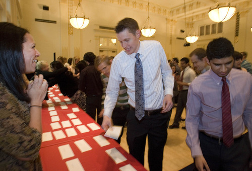 Paul Fraughton | The Salt Lake Tribune
Kevin Dahle picks up the envelope that will determine his future as a doctor for the next few years. Match Day, where graduating medical students find out where they will do their residencies,  took place at Gardner Hall on the University of Utah campus on
Friday, March 16, 2012.