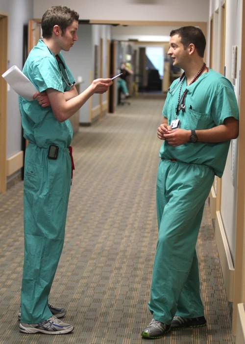 Rick Egan  | The Salt Lake Tribune 
U. student Kevin Dahle chats with a fellow medical student, Wiley Thuet at the Intermountain Medical Center, just days before he learns where he'll do his residency and spend the next four years.