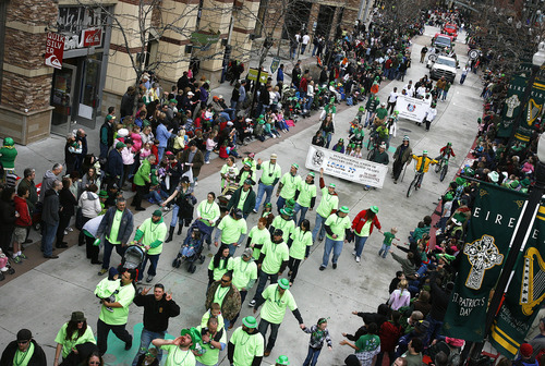 Scott Sommerdorf  |  The Salt Lake Tribune
The St. Patrick's Day Parade winds through The Gateway last year.