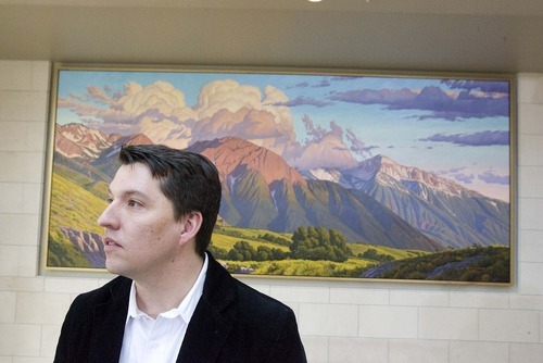 Tribune file photo
Artist David Meikle in front of his mural of Mt. Olympus unveiled at the City Creek Center in downtown Salt Lake City in 2010.