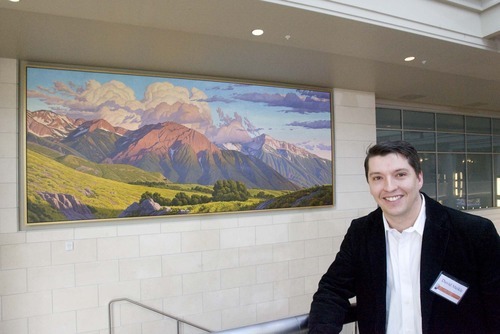 Tribune file photo
Artist David Meikle in front of his mural of Mt. Olympus unveiled at the City Creek Center in downtown Salt Lake City in 2010.