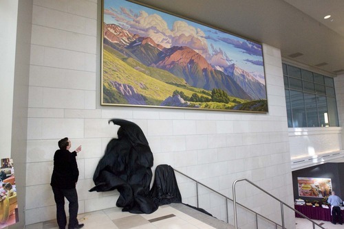 Tribune file photo
Artist David Meikle unveils his mural of Mt. Olympus at the City Creek Center in downtown Salt Lake City in 2010.
