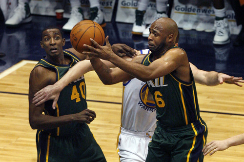 Scott Sommerdorf  |  The Salt Lake Tribune             
Jamaal Tinsley of the Jazz drives with the ball as team mate Jeremy Evans watches at left during first half play. The Utah Jazz trailed the Golden State Warriors 51-46 at the half at Energy Solutions Arena, Saturday, March 17, 2012.