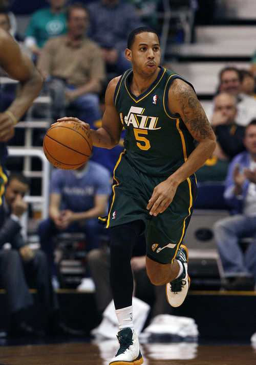 Scott Sommerdorf  |  The Salt Lake Tribune             
Jazz guard Devin harris brings the ball upcourt during first half play. The Utah Jazz trailed the Golden State Warriors 51-46 at the half at Energy Solutions Arena, Saturday, March 17, 2012.