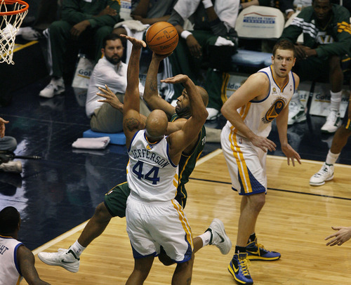Scott Sommerdorf  |  The Salt Lake Tribune             
Jazz guard Jamaal Tinsley drives to the basket past the Warrior's Richard Jefferson during first half play.The Utah Jazz trailed the Golden State Warriors 51-46 at the half at Energy Solutions Arena, Saturday, March 17, 2012.