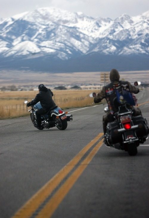 Kim Raff |  The Salt Lake Tribune
Riders drive toward the Miller Motorsport Park in Grantsville on Sunday during the 35th annual Polar Bear Ride to celebrate the 70th anniversary of the Salt Lake Motorcycle Club.
