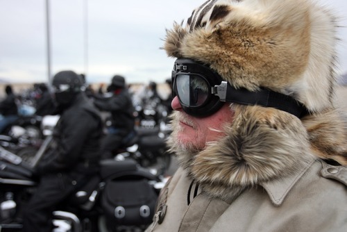 Kim Raff  |  The Salt Lake Tribune
Terry Tuke gets on his motorcyle Sunday at Miller Motorsports Park in Grantsville to make the final leg of the 35th annual Polar Bear Ride to celebrate the 70th anniversary of the Salt Lake Motorcycle Club.