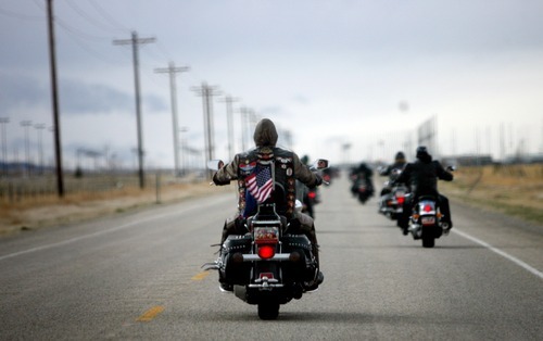 Kim Raff  |  The Salt Lake Tribune
Riders drive toward the Miller Motorsports Park in Grantsville on Sunday during the 35th annual Polar Bear Ride to celebrate the 70th anniversary of the Salt Lake Motorcycle Club.