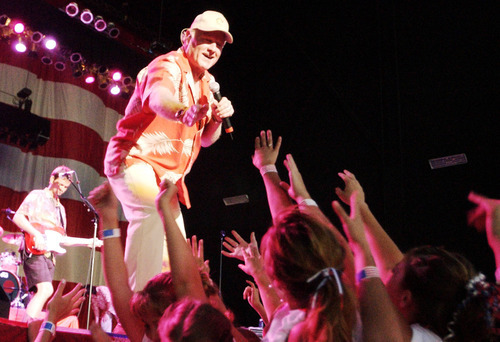 Tribune file photo
The Beach Boys perform at the USANA Amphitheatre in West Valley City in July 2003.