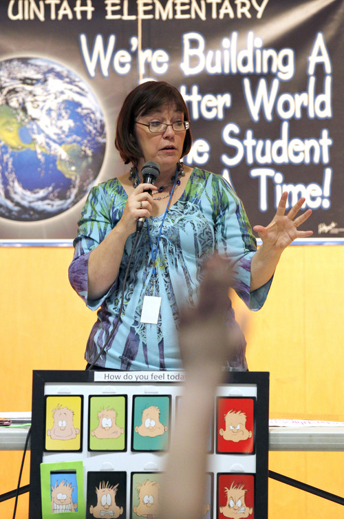 Al Hartmann  |  The Salt Lake Tribune
Julie Schwartz of the National Alliance on Mental Illness speaks to students at Uintah Elementary School in Salt Lake City on Thursda,y March 15.