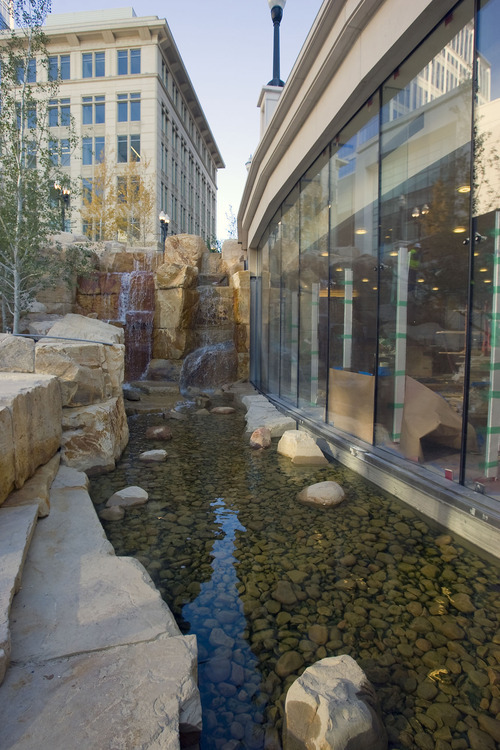 AAl Hartmann   |  The Salt Lake Tribune 
The new mall has no shortage of dramatic elements, including two 18-foot waterfalls and a 1,200-foot re-creation of its namesake City Creek that runs the length of the mall.