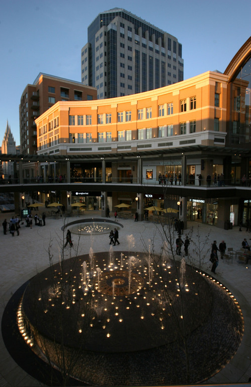 Steve Griffin  |  The Salt Lake Tribune

 The outdoor fountains light up as the sun sets during the City Creek Center Charity Gala in Salt Lake City on Wednesday. The event featured entertainment, food and beverages and a chance to be one of the first to shop the City Creek Center stores.