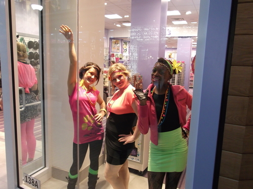 Sean P. Means  |  The Salt Lake Tribune
Neon-clad employees at Claire's Accessories dance and strike poses in the store window during Wednesday's charity gala at City Creek Plaza.