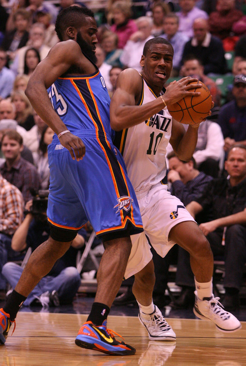 Leah Hogsten  |  The Salt Lake Tribune
Jazz's Alec Burks rounds the hip of the Thunder's James Harden.  Utah Jazz lead 52-44 after the first half against Oklahoma City Thunder, Tuesday, March 20, 2012, at the Energy Solutions Arena in Salt Lake City, Utah .