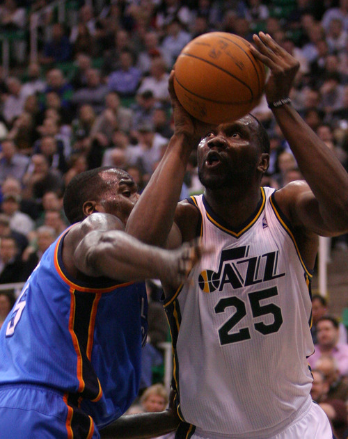 Leah Hogsten  |  The Salt Lake Tribune
Utah Jazz's Al Jefferson battles the Thunder's Kendrick Perkins during the first half against Oklahoma City Thunder, Tuesday, March 20, 2012, at the Energy Solutions Arena in Salt Lake City, Utah .