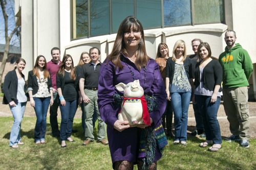 Chris Detrick  |  The Salt Lake Tribune
CEO Julie Jakob poses for a portrait with her employees outside of Jakob Marketing Partners office Thursday March 22, 2012.