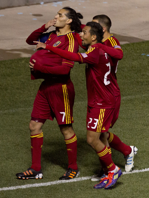 Trent Nelson  |  The Salt Lake Tribune
Real Salt Lake's Fabian Espindola (7) puts the ball under his shirt and blows a kiss to his pregnant wife after scoring a first half goal. Real Salt Lake vs. New York Red Bulls, MLS Soccer Saturday, March 17, 2012 at Rio Tinto Stadium in Sandy, Utah.