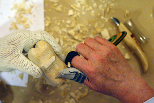 Steve Griffin  |  The Salt Lake Tribune
Gloves help protect a woodcarver at the Great Salt Lake Woodcarvers Club meeting at Wheeler Farm in Murray.