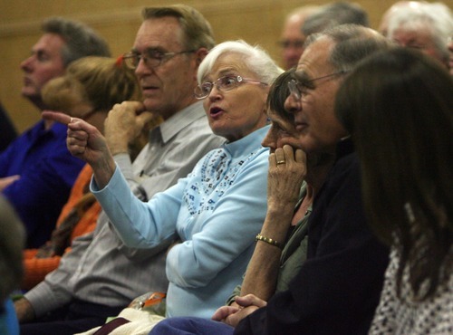 Kim Raff | The Salt Lake Tribune
Jeanne Nielsen directs stern questions to MTC director Richard Heaton during a neighborhood meeting at Rock Canyon Elementary School in Provo to discuss building a new nine-story MTC building on March 22, 2012.