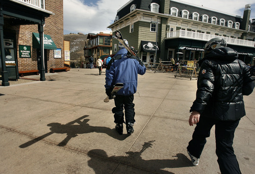 Scott Sommerdorf  |  The Salt Lake Tribune             
Skiiers head off the slopes past shops and restaurants that cater to them at Park City Mountain Resort, Friday, March 16, 2012. The shadow of a legal action hangs over Park City Mountain Resort due to its legal dispute with Talisker Corporation. Unless its court action to stop expiration of the lease is successful, the resort might not open next year. That would have a huge economic impact on the entire town.