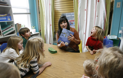 Francisco Kjolseth  |  The Salt Lake Tribune
Spanish teacher Silvia Cedeno jokes around as she asks students if books are for eating, prompting them engage in nothing but Spanish at the McKee Spanish immersion preschool in Salt Lake on March 14. When picking a preschool for your child, numerous options are available in terms of focus of curriculum.