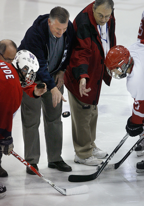 Scott Sommerdorf  |  The Salt Lake Tribune             
Salt Lake County Mayor Peter Corroon drops the ceremonial first puck prior to the Regis Jesuit Raiders (Colo) and the Waterloo Warriors (Iowa) played for the 2012 USA High School Hockey Championship, Sunday, March 25, 2012.
