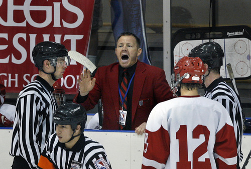 Scott Sommerdorf  |  The Salt Lake Tribune             
Regis Jesuit acting head coach Terry Ott argues a bench minor penalty for too many men on the ice during third period play. The Regis Jesuit (Colo) Raiders won the 2012 USA High School Hockey Championship with a 4-3 win over the Waterloo (Iowa) Warriors, Sunday, March 25, 2012.