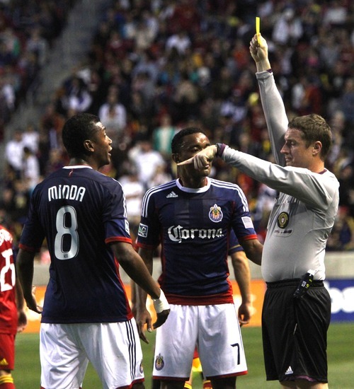 Rick Egan  | The Salt Lake Tribune 

Chivas USA's  Oswaldo Minda gets a yellow card, in MLS soccer action in Sandy, Saturday, March 24, 2012.