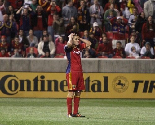 Rick Egan  | The Salt Lake Tribune 

Real Salt Lake's Fabian Espindola (7) reacts after narrowly missing a goal, late in the game, in MLS soccer action in Sandy, Saturday, March 24, 2012.