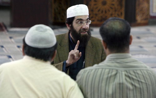Francisco Kjolseth  |  The Salt Lake Tribune
Imam Muhammed S. Mehtar of the Islamic Society of Great Salt Lake in West Valley City leads a discussion following prayers on Monday, May 2, 2011.