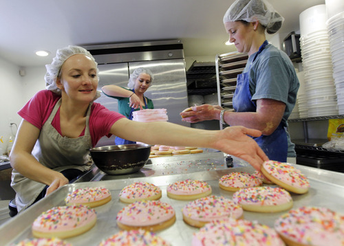 Al Hartmann  |  The Salt Lake Tribune
Assistant Manager Cristen Carrell, left, baking intern Kylee Ellswroth and co-founder and executive baker Nicole Lawson work together March 23 to make 400 gluten-free sugar cookies at New Grains Gluten-Free Bakery in Provo.