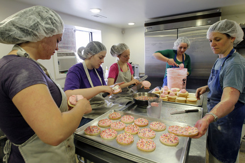 Al Hartmann  |  The Salt Lake Tribune
Employee Kendra Clark, left, baking intern Maggie Arnoldus, Assistant Manager Cristen Carrell, baking intern Kylee Ellswroth and co-founder and executive baker Nicole Lawson work together Friday March 23 to make 400 gluten free sugar cookies in the basement of Tim Lawson's Provo home.