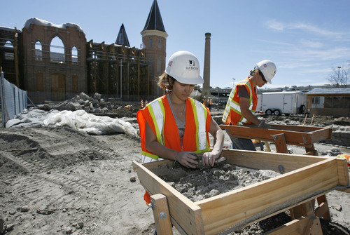 Francisco Kjolseth  |  The Salt Lake Tribune
BYU archaeology students Karley Salinas, left, and Shelley Watts sift through the dirt pulled from the site of the old Tabernacle completed in 1867 which has been revealed once again beside the current Tabernacle which burned in December of 2010. The Office of Public Archeology at Brigham Young University is meticulously recording what they find as they dig through the original foundation of the building which once stood three stories tall.