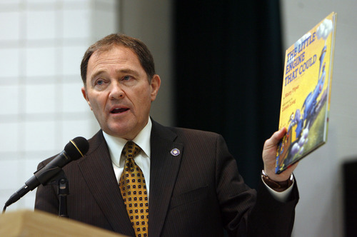 Francisco Kjolseth  |  The Salt Lake Tribune
Governor Gary R. Herbert illustrates his point about moving education forward with the classic book 