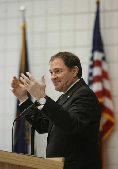 Francisco Kjolseth  |  The Salt Lake Tribune
Gov. Gary Herbert praises the flag presentation put on by the third-grade class from Falcon Ridge Elementary in West Jordan as he gets ready to signs three education-related bills at the school on Tuesday, March 27, 2012.
