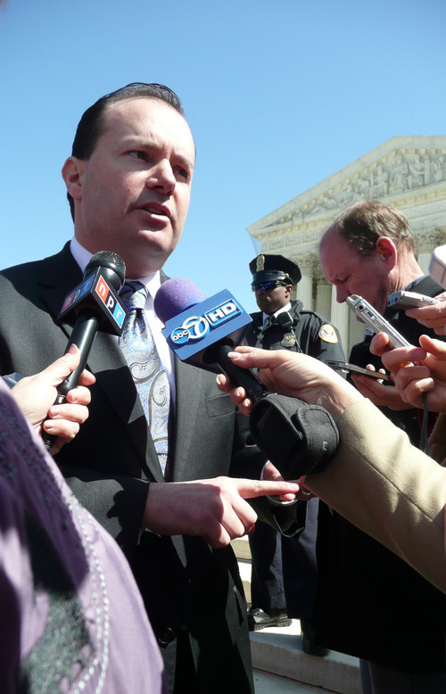 Matt Canham  |  The Salt Lake Tribune
Sen. Mike Lee, R-Utah, talks with reporters after Tuesday's Supreme Court hearing on health reform.