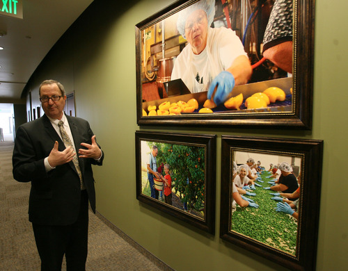Steve Griffin  |  The Salt Lake Tribune
Richard Humpherys, manager of the LDS Church's new Bishops' Central Storehouse in Salt Lake City, talks about the services the storehouse provides in a hallway lined with inspirational quotes and photos.