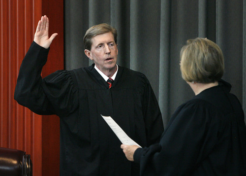 Scott Sommerdorf  |  The Salt Lake Tribune             
Justice Matthew B. Durrant was sworn in Monday, March 25, 2012, as the new Chief Justice of the Utah Supreme Court by former Chief Justice Christine M. Durham.