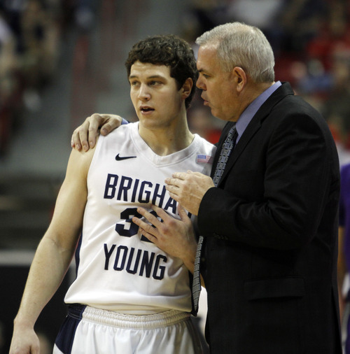 Rick Egan  | Salt Lake Tribune

BYU head coach Dave Rose talks to BYU guard Jimmer Fredette (32), during a break in the action,  BYU vs. TCU, in the Mountain West Conference Championships in Las Vegas, Thursday, March 10, 2011