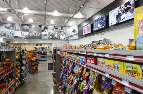 Trent Nelson  |  Tribune file photo
The ProStop Convenience Store in Draper offers big screen televisions that broadcast Jazz games and show highlights of past action of the Larry H. Miller sports properties. ProStop officially opened its third location, in Riverton, this week.